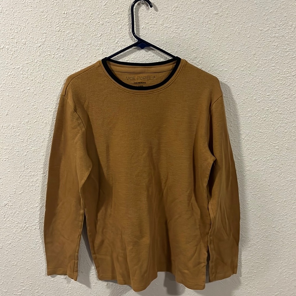 Large waffle pattern long sleeve brown shirt.